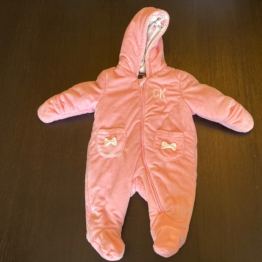 Calvin Klein snowsuit size 3/6 months. Color pink